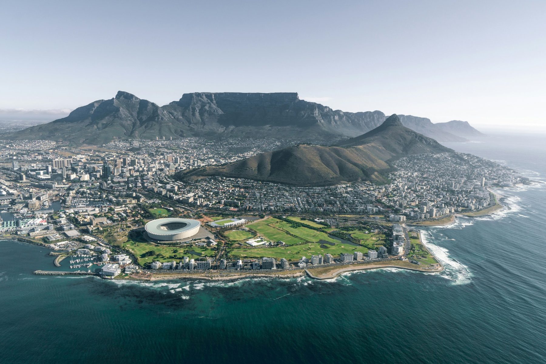 Aerial view of Cape Town with Table Mountain and Lion's Head above the Atlantic