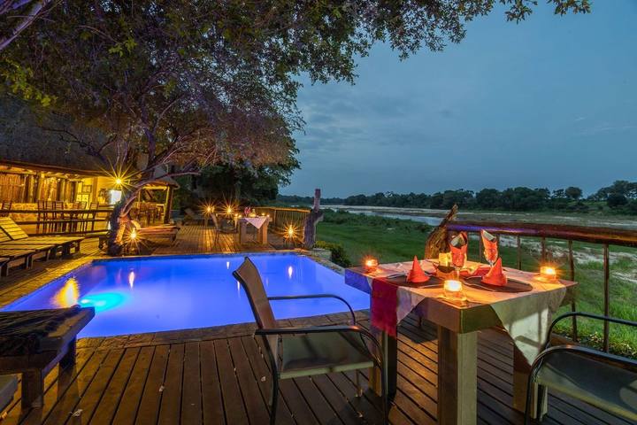 Riverside pool at dusk, Umkumbe